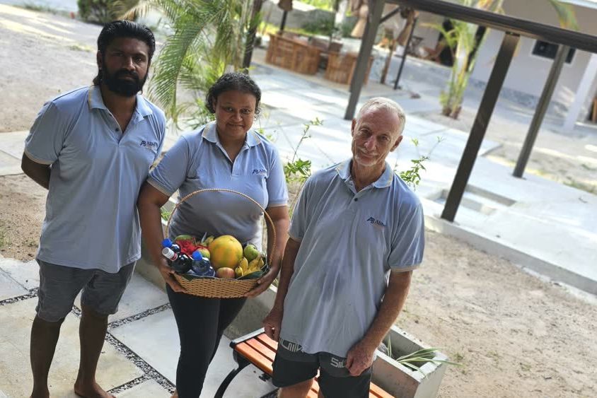 TC, Salifa and William Bell, the family who built and host AliBel Beach Villa