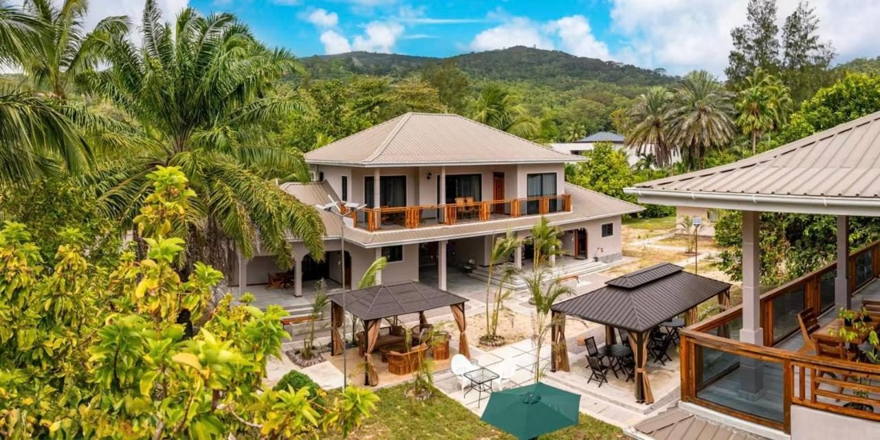 AliBel Beach Villa at Anse à la Mouche on Mahé, with the mountain behind it