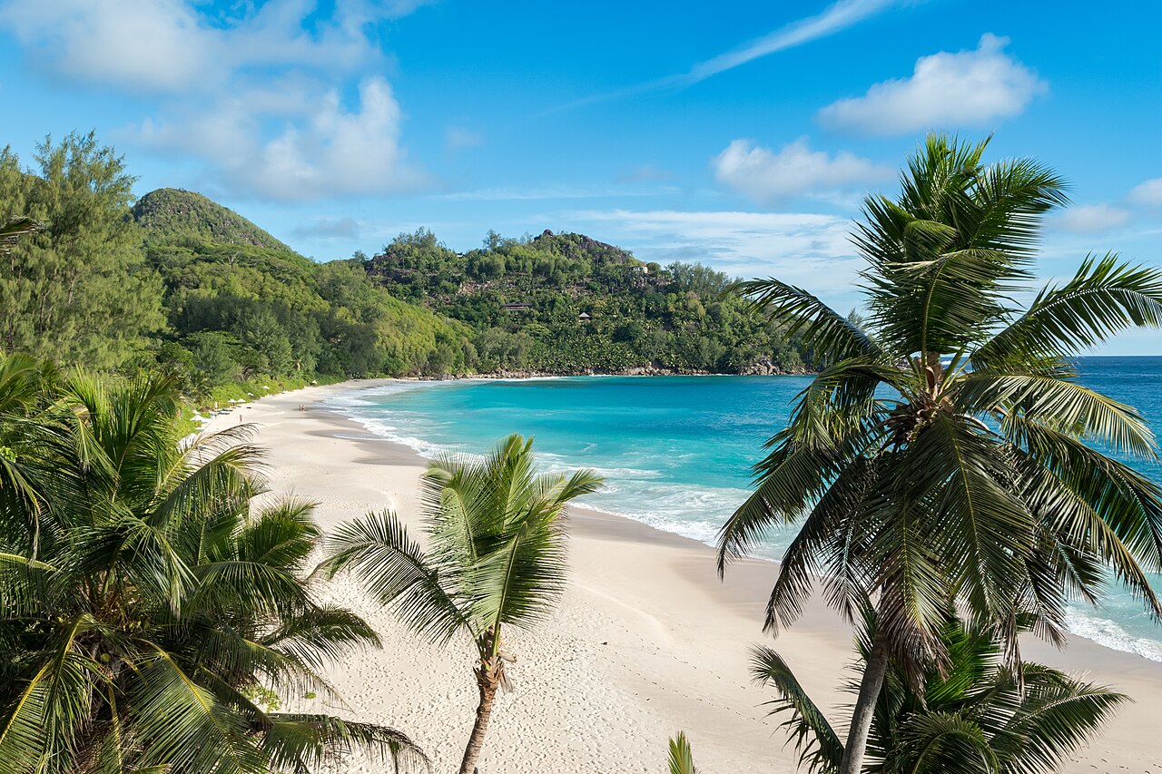 Surf breaking on the steep sand at Anse Intendance on the south coast of Mahé.