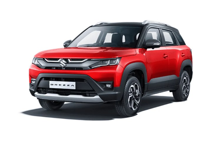 Red Suzuki Brezza SUV, front three quarter view on a plain studio ground