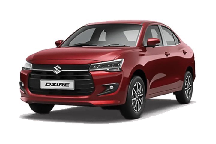Dark red Suzuki Dzire saloon, front three quarter view on a plain studio ground