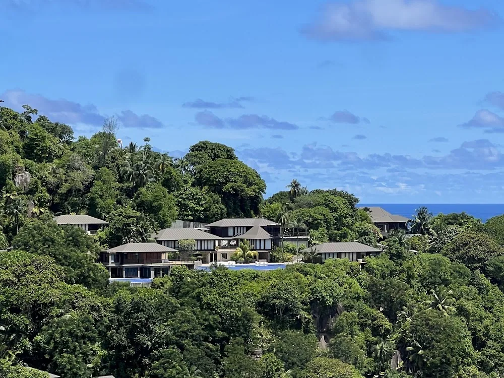 Four Seasons Resort Seychelles, Mahé. A view of the beach.