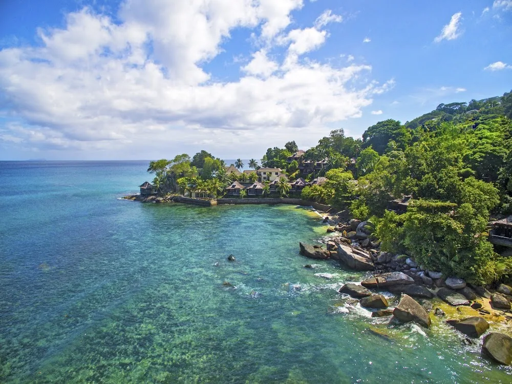 Hilton Seychelles Northolme Resort and Spa, Mahé. A view of the beach.
