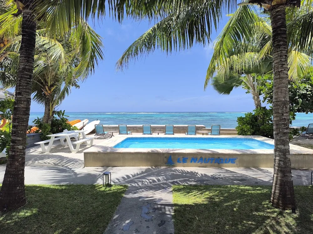 Le Nautique Luxury Beachfront Apartments, Mahé. A view of the beach.
