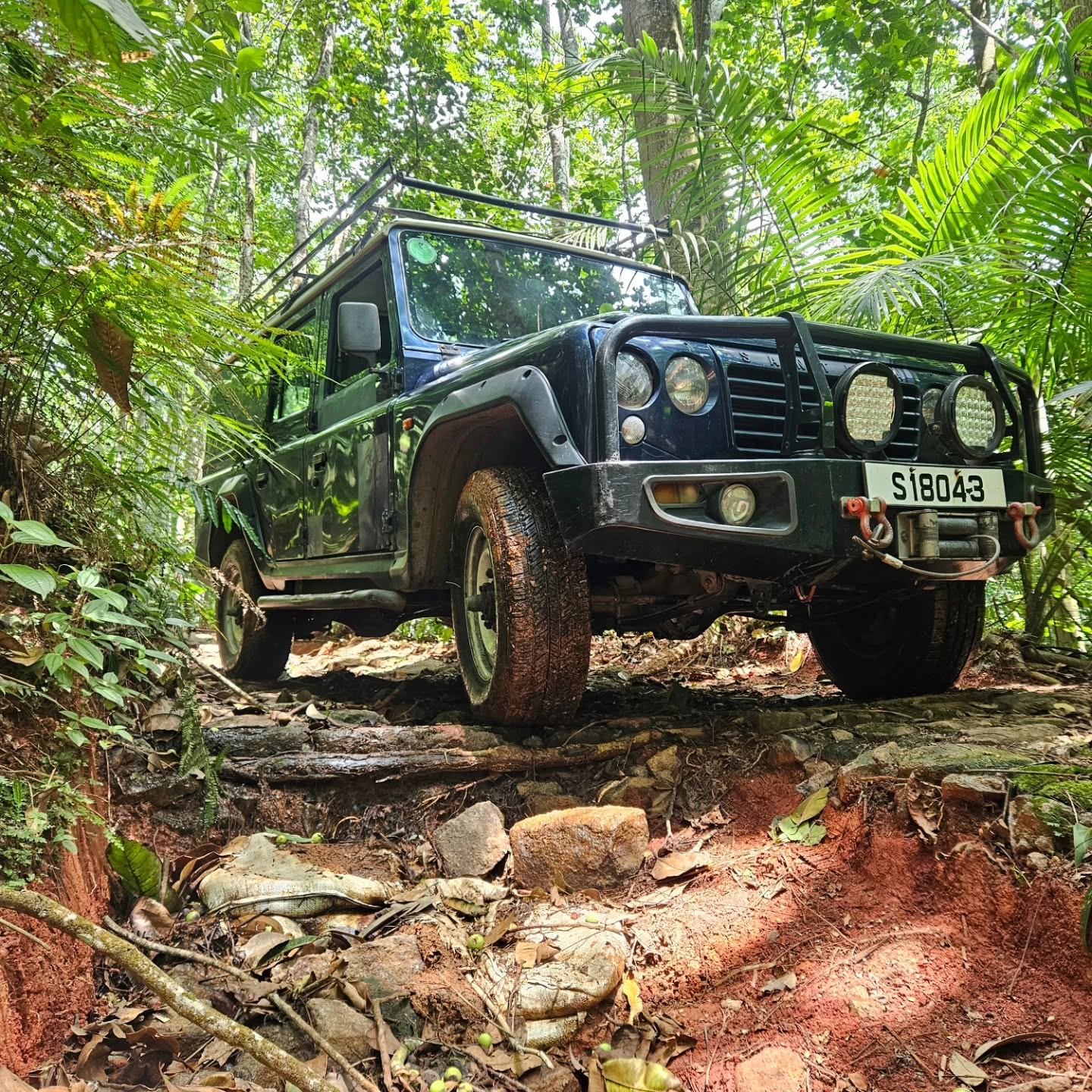 Land Rover Defender on a jungle trail, Mahé