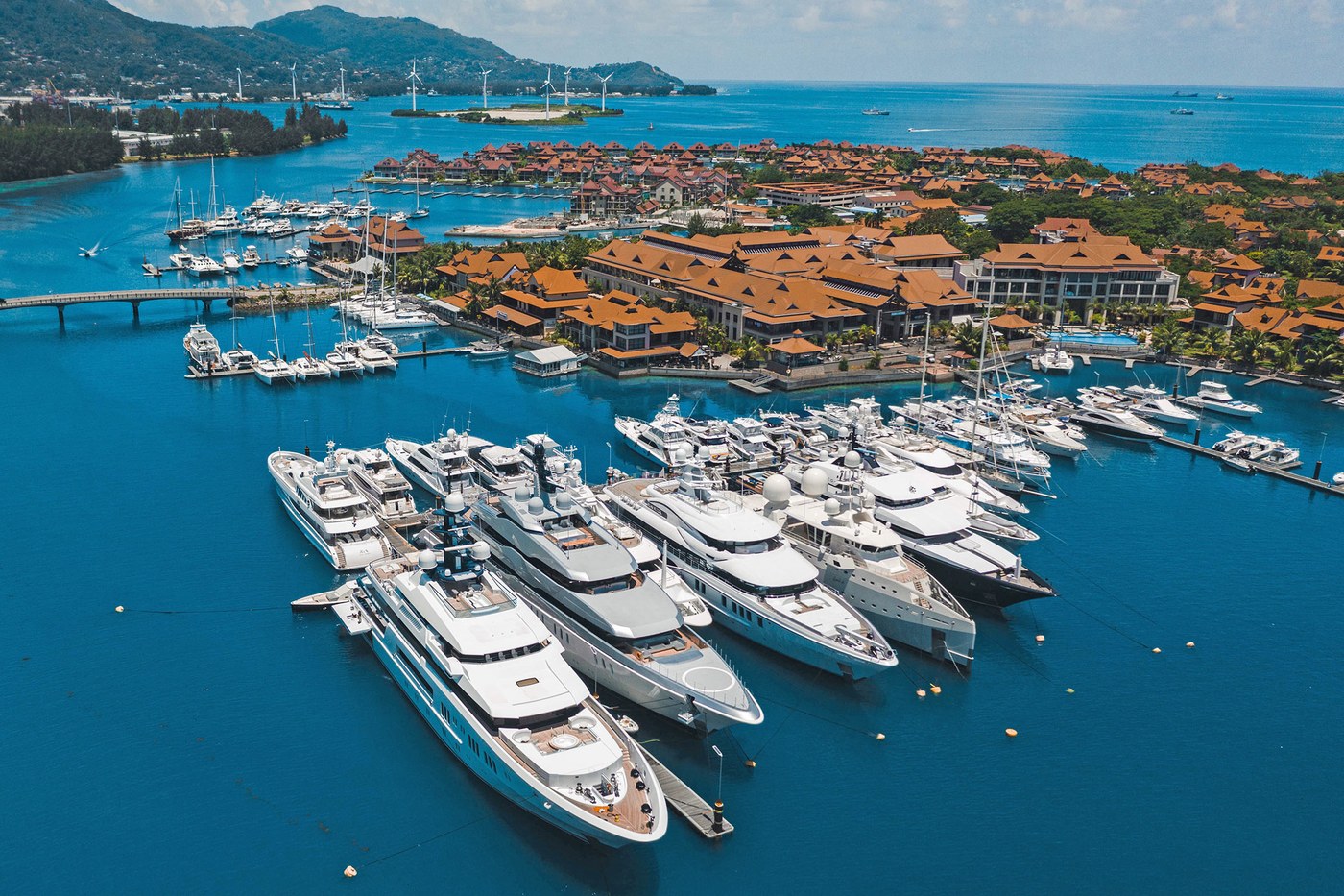 A wide aerial of the Eden Island marina with the superyacht basin in the foreground