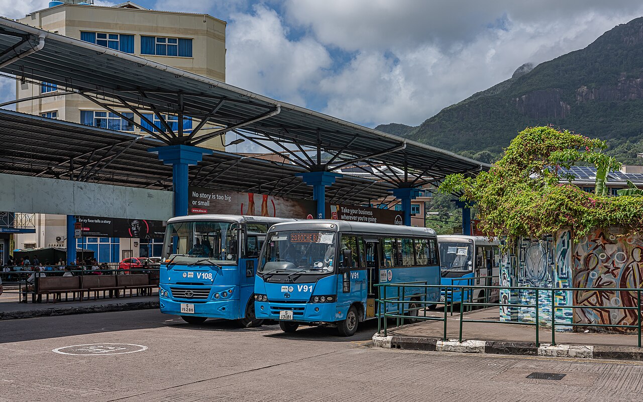 Buses under the canopy at the Victoria bus terminal.