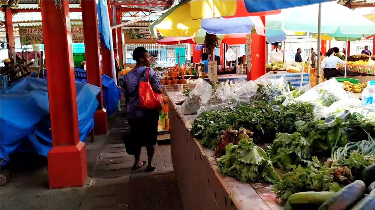 The produce aisles at the Victoria market.
